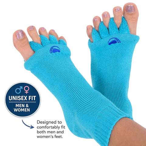 Woman's feet wearing Blue foot alignment socks with a unisex fit symbol